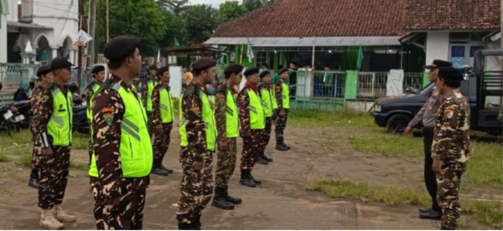 Sinergi Banser–Polri: Latihan Gabungan Balantas dan Buka Puasa Bareng di Purwokerto Barat
