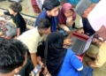 Mahasiswa STMIK Widya Utama Beri Edukasi Hukum Digital untuk Anak Pekerja Migran di Malaysia