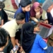 Mahasiswa STMIK Widya Utama Beri Edukasi Hukum Digital untuk Anak Pekerja Migran di Malaysia