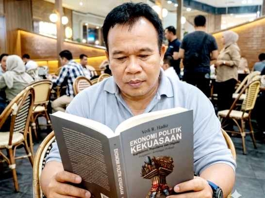 MERAYAKAN ATAU MENGUTUK OLIGARKI?